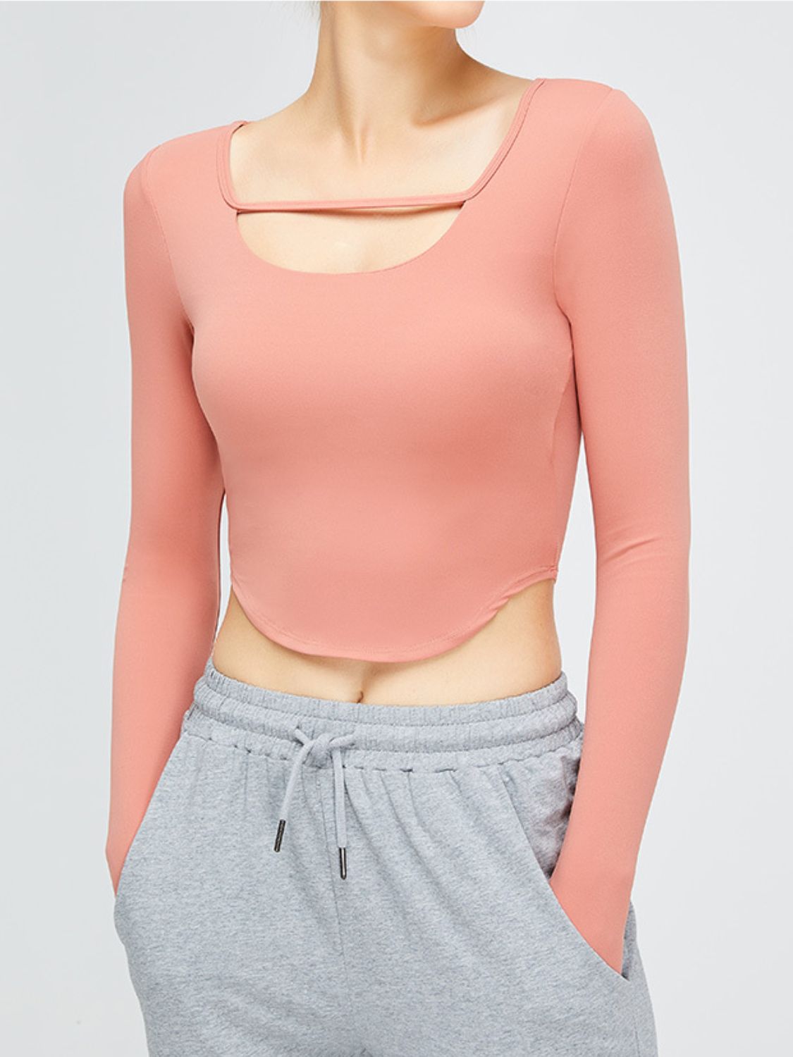 Cutout Curved Hem Cropped Sports Top